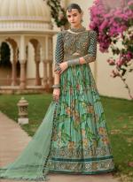 Silk Teal Ceremonial Wear Foil Print Readymade Gown With Dupatta